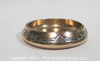 Three Piece Sterling Silver on Bronze Arts & Craft Period Nesting Trinket Trays Made by Heintz Art Metal for RH Macy Department Stores.  They measure approximately 3 1/2" in diameter.