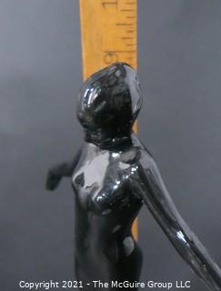 Art Deco Cast Iron with Black Enamel Paint Statue of Nude Female Attached to Frosted Glass Ashtray Base.  Measures approximately 9" tall.