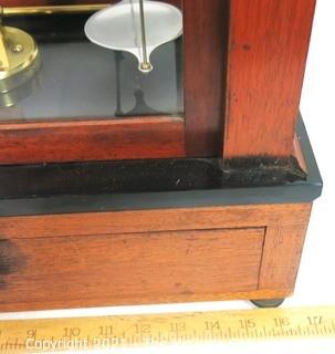 Antique Triple Beam Balance Gold or Apothecary Cabinet Scale in a Glass and Wood Case Made by Voland & Sons of New Rochelle, NY, 1912. It has glass panels on all four side and has one drawer with box of scale weights. It measures approximately 21" x 16" x 9".