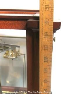 Antique Triple Beam Balance Gold or Apothecary Cabinet Scale in a Glass and Wood Case Made by Voland & Sons of New Rochelle, NY, 1912. It has glass panels on all four side and has one drawer with box of scale weights. It measures approximately 21" x 16" x 9".