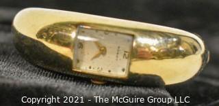 Watch: Vintage women's gold-tone hinged bracelet watch by Robot (untested)