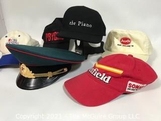 Hats including Formula One Williams Racing Team and USSR Military.  