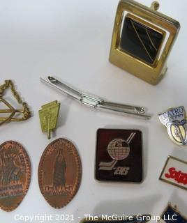 Eclectic collection of pins, jewelry and other items