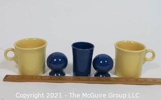 Group of Vintage Fiestaware Items in Yellow and Navy Blue.