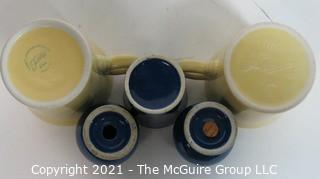 Group of Vintage Fiestaware Items in Yellow and Navy Blue.