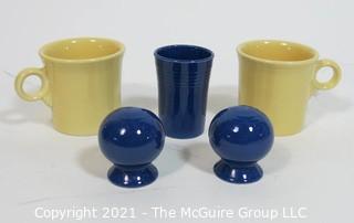 Group of Vintage Fiestaware Items in Yellow and Navy Blue.