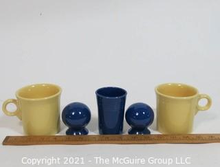 Group of Vintage Fiestaware Items in Yellow and Navy Blue.