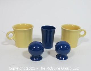 Group of Vintage Fiestaware Items in Yellow and Navy Blue.