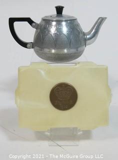 Two Vintage 1953 Queen Elizabeth Royal Coronation Items Including Metal Teapot and Celluloid Box.
