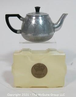 Two Vintage 1953 Queen Elizabeth Royal Coronation Items Including Metal Teapot and Celluloid Box.
