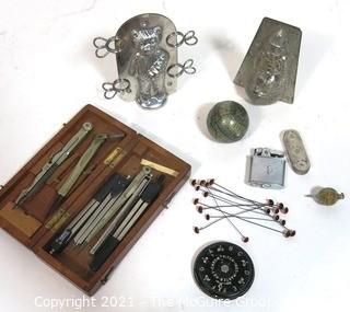 Group of Items including Two Chocolate Molds, Drafting Tools, Hat Pins, Lighter, Coin Holder and Pitch Tuner