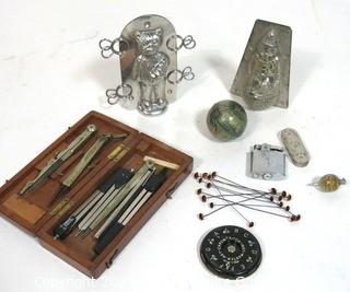 Group of Items including Two Chocolate Molds, Drafting Tools, Hat Pins, Lighter, Coin Holder and Pitch Tuner