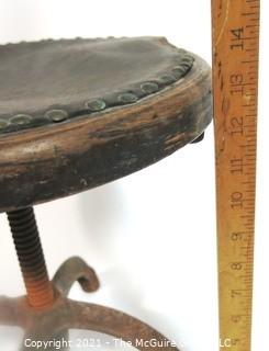 Vintage Rotating Stool with Metal Industrial Base. 