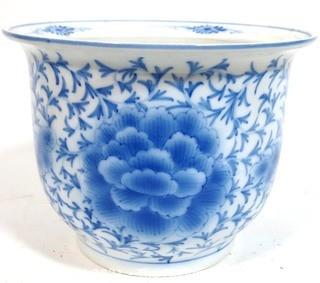 Large Heavy Asian Blue and White Porcelain Planter.  Measures approximately 12" in diameter and 9" tall