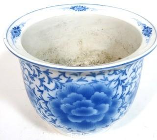 Large Heavy Asian Blue and White Porcelain Planter.  Measures approximately 12" in diameter and 9" tall