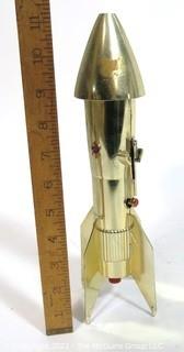 Vintage Astro Berzac Rocket Ship Mechanical Coin Bank.  Measures approximately 11" tall.