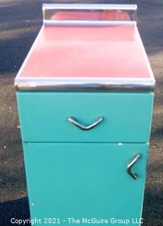 Vintage Blue Metal Cabinet with Red Linoleum and Chroma Edge Top.  Measures approximately 24D x 15W x 36"T