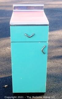 Vintage Blue Metal Cabinet with Red Linoleum and Chroma Edge Top.  Measures approximately 24D x 15W x 36"T