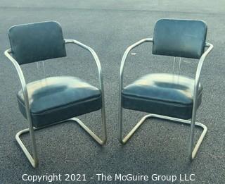 Pair of Vintage Mid Century Modern Chrome with Green Vinyl Chairs.  