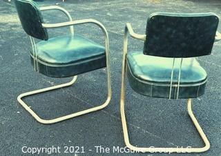 Pair of Vintage Mid Century Modern Chrome with Green Vinyl Chairs.  