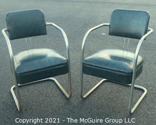 Pair of Vintage Mid Century Modern Chrome with Green Vinyl Chairs.  