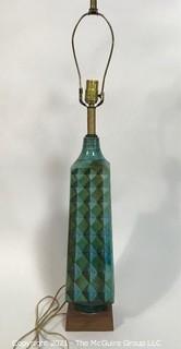 Vintage Mid Century Modern Ceramic Pottery Lamp.  It measures approximately 33" tall. 