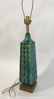 Vintage Mid Century Modern Ceramic Pottery Lamp.  It measures approximately 33" tall. 