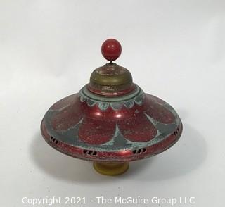 Antique Pressed Tin 'Whistling' push down spinning top with plastic base