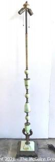 Vintage Two Light Cast Iron Floor Lamp with Green Stone and Metal Decoration. 