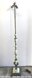 Vintage Two Light Cast Iron Floor Lamp with Green Stone and Metal Decoration. 