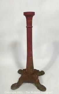 Cast iron Red Painted Stand.  Measures approximately 24" tall.