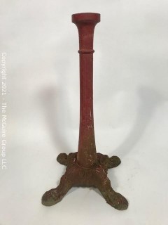 Cast iron Red Painted Stand.  Measures approximately 24" tall.