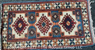 Hand Woven Oriental Rug.  Measures approximately 26" x 49".