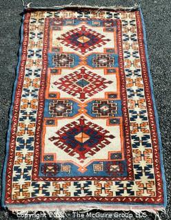 Hand Woven Oriental Rug.  Measures approximately 26" x 49".