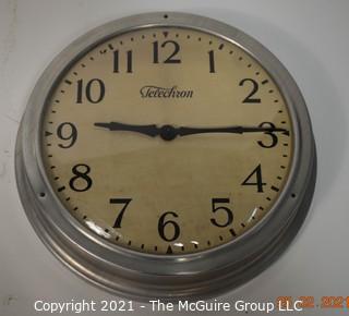 Telechron Vintage Chrome and Glass Industrial Electric Wall Clock.  Needs repair.  Measures approximately 12" Diameter. 