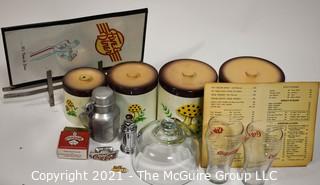 Collection including vintage diner menus, Coca Cola, Aluminum Karo Syrup container, and glass cloche and nesting set of canisters 