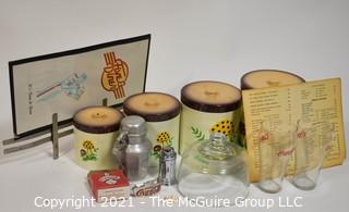 Collection including vintage diner menus, Coca Cola, Aluminum Karo Syrup container, and glass cloche and nesting set of canisters 