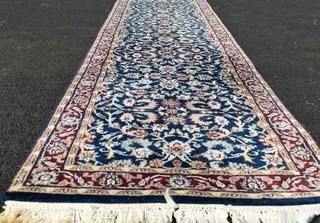 Hand Woven & Knotted Runner on Blue Ground.  Measures approximately 2'4" x 18'8".