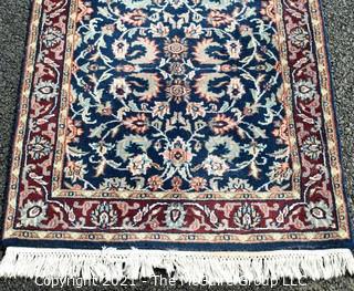 Hand Woven & Knotted Runner on Blue Ground.  Measures approximately 2'4" x 18'8".