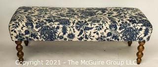 Blue & White Upholstered Bench with Spindle Legs.  Measures approximately 5' long. 