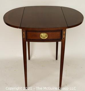 Sheraton Style Pembroke Mahogany Drop Leaf Table with Satinwood Inlay, made by Councill;  25"T and extends to 29"W with leaves up.