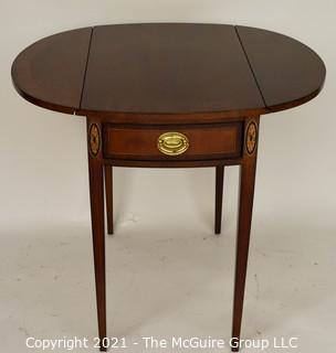 Sheraton Style Pembroke Mahogany Drop Leaf Table with Satinwood Inlay, made by Councill;  25"T and extends to 29"W with leaves up.