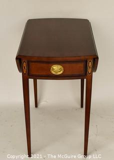 Sheraton Style Pembroke Mahogany Drop Leaf Table with Satinwood Inlay, made by Councill;  25"T and extends to 29"W with leaves up.