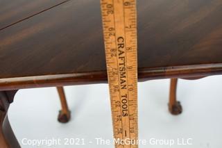 Queen Anne Handkerchief Triangular Gate Leg Corner Table with Paw Feet.  Measures approximately 27"  tall and 28" when open. 