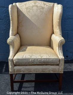 Yellow Damask Upholstered Wing Back Chair. {Note: repaired leg}