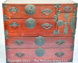 Asian Tansu Chest on Chest with Bronze Hardware.  Some damage to drawers and back.  WE HAVE NO MEASUREMENTS FOR THIS 