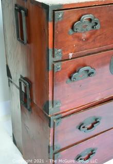 Asian Tansu Chest on Chest with Bronze Hardware.  Some damage to drawers and back.  WE HAVE NO MEASUREMENTS FOR THIS 