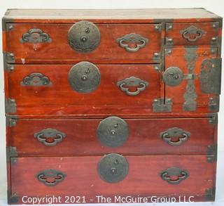 Asian Tansu Chest on Chest with Bronze Hardware.  Some damage to drawers and back.  WE HAVE NO MEASUREMENTS FOR THIS 