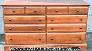 Cherry Wood Vaughan Bassett Furniture Ten Drawer Dresser.  Measures approximately 56"W x 34"T