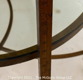 Oval Heavy Gilt Cast Iron Coffee Table with Glass Insert.  Measures approximately 49"long x 34" wide